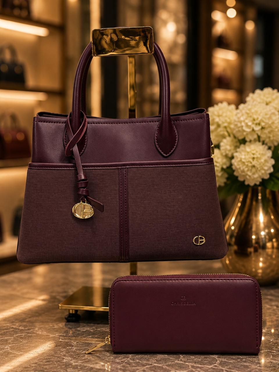 An Exclusive Burgundy Handbag.