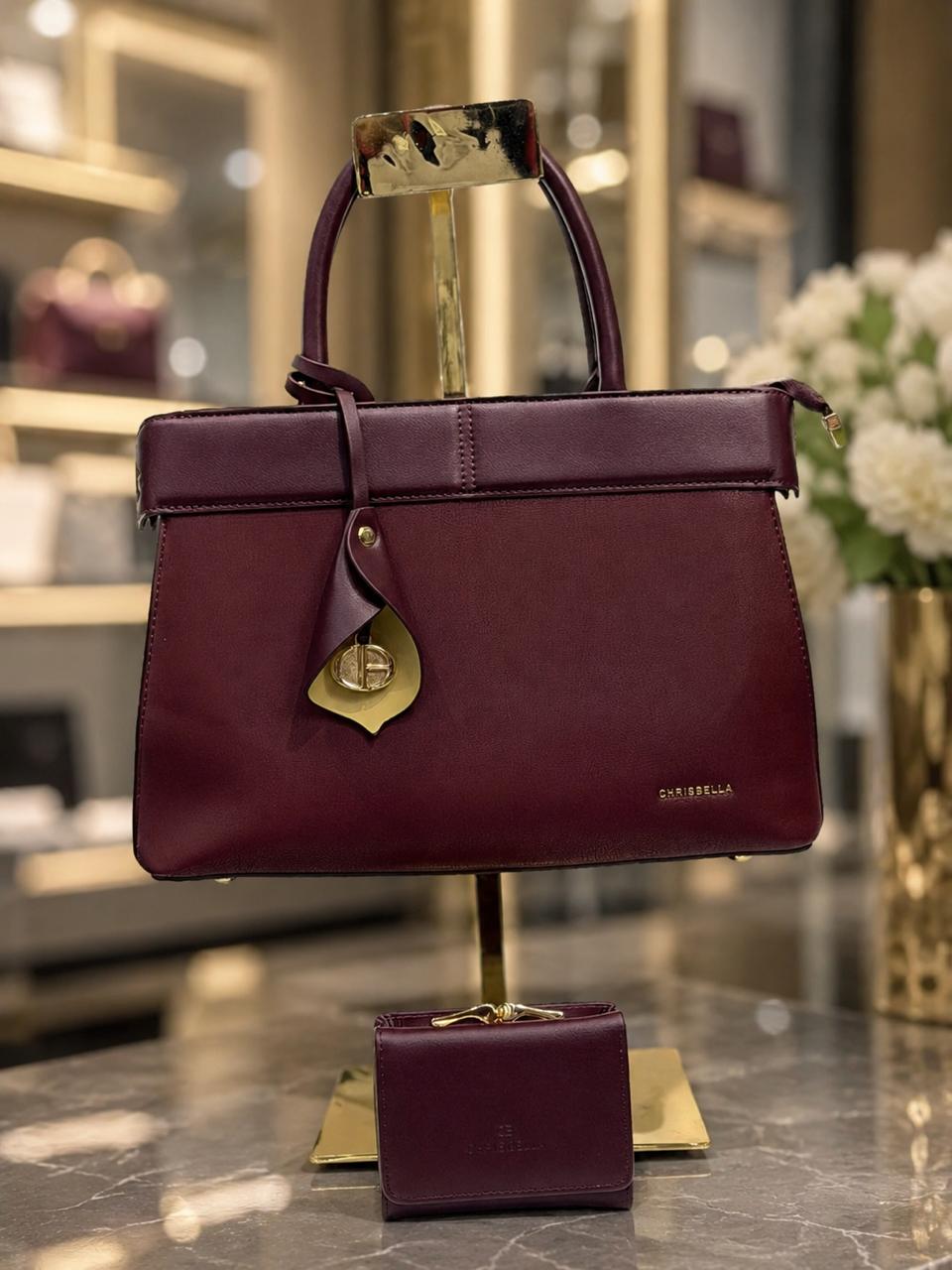Elegant and Versatile Burgundy Handbag.
